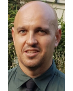 Portrait of Milo Izzinosa, Founder & AI Transformation Lead at Artificial Mind Solutions